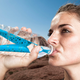 Illustration for article titled A Slim Filter That Purifies Water Bottles From the Inside